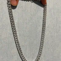 گردن بند و دستبند طرح کارتیر