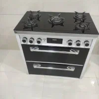 اجاق گاز طرح فر کابینتی با رویه ی شیشه ای