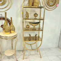 بوفه ویترین فلزی طلایی آینهدار بیضی