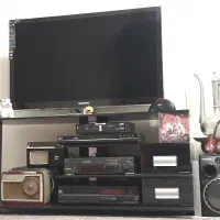 میز تلویزیون شیشه ای