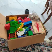 فروش ی جعبه اسباب بازی به همراه یک پازل کتابی