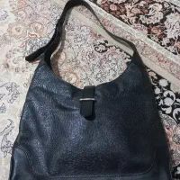 کیف چرم مشهد وکفش مایکل کورس و کتونی اسیکس
