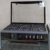 اجاق گاز طرح فر و کابینت با سینک وشیرآلات فروشی