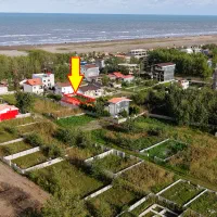 زمین ساحلی دیواربلند مشرف به دریا قابل ساخت