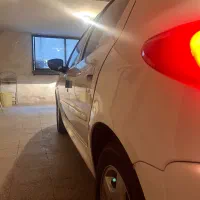 پژو ۲۰۷ اتوماتیک tu5p (ارتقا یافته) سفید سقف فلز|خودرو سواری و وانت|تهران, تجریش|دیوار