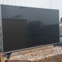 تلویزیون ال جی ۴۹ اینچ و میز تلویزیون