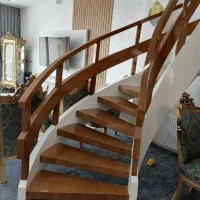 جوشکاری انواع  پله های گرد اجرای چوب نما کف پله