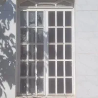 پنجره و درب آهنی و درب چوبی
