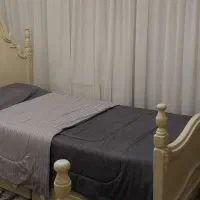 دو عدد تخت یک نفره و کمد