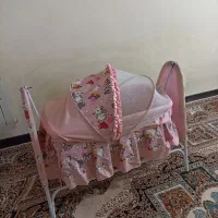 گهواره با پشه بند