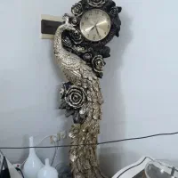 ساعت طرح طاووس.