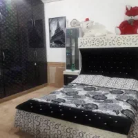 تختخواب دونفره همراه بادوعددپاتختی ومیزآرایشی