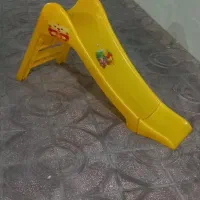 سرسره اسباب بازی و اسکوتر بچه