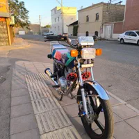 موتور اسپورت با کلی لوازم همه چی تو عکس مشخصه