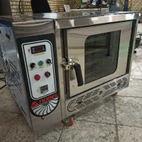 فر ۴سینی همراه با پایه یی که فر رو اون بایسته