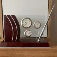 ساعت سه زمانه همراه با خودکار