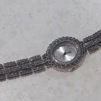 ساعت نقره سیاه قلم