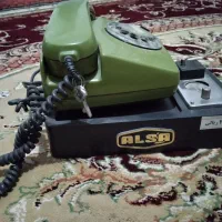 علاالدین و تلفن سکه ای. ترازو