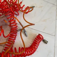 شلنگ پمپ باد و دستگاه دکمه زن