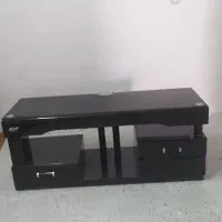 زیر تلویزیونی شیشه ای