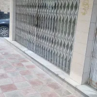 مغازه-25-متری-شامل-برق-و-اب-درب-برقی