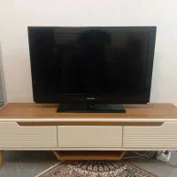 تلویزیون بهمراه میز و مبل نیم ست