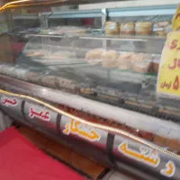 ویترین شیشه خم تمام استیل فروشگاه رشته خشکار