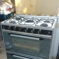 اجاق گاز فر دار نوین تمییز آماده برای مصرف