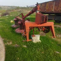 گاوآهن یونجه بر یونجه جمع کن