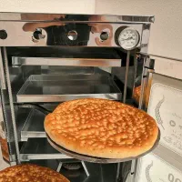 دیگ تنوری حاج رحمان