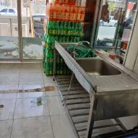 یک عدد سینک صنعتی استیل ویک عدد ترازو توزین صدر