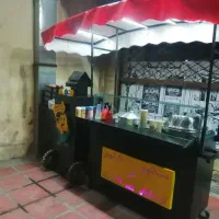 میز آش و فرنی و ذرت مکزیکی با سایه بان