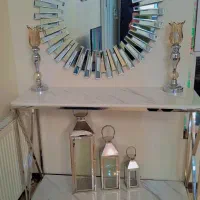 آینه خورشیدی و میز کنسول استیل