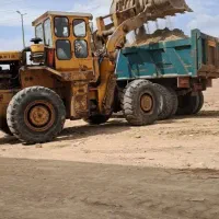 لودر و کمپرسی.ریگ .خاک .مل .شن و ماسه