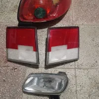 چراغ خطر ماشین و درب عقب پراید سمت چپ