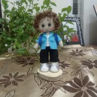 عروسک دانش اموز