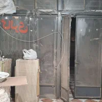 درب مغازه دو لنگه