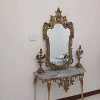 آیینه کنسول و شمعدان برنجی