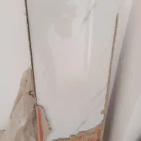 تعدادیی سرامیک و درب ورودی