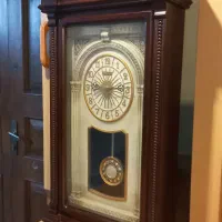 ساعت دیواری آونگ دار