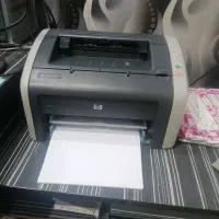 پرینتر hp 1010 با یکعدد کارتریچ اضافه