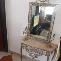 اینه وشمعدان وکنسول برنجی