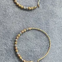 گوشواره حلقه ای دو جفت .یک عدد تکپوش