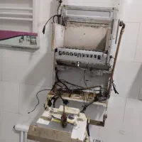 نمایندگی خدمات«پکیجشوفاژدیواری،رادیاتور»بوتان|خدمات پیشه و مهارت|نورآباد ممسنی, |دیوار