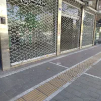 مغازه حاشیه عبدالمطلب/در دوطبقه