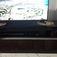 میز تلویزیون ساعت دیواری