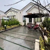 همکف-مشجر200-متری-3خوابه-مدارک-کامل-زیرقی-مت