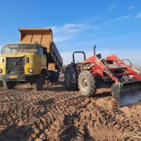 تراکتور بیل دار و ماشین کمپرسی