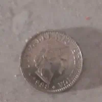 انگشتر نقره وسکه خارجی وایرانی