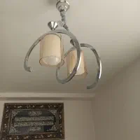 لوستر دوشعله نو یه ماه استفاده کردم جنس استیل